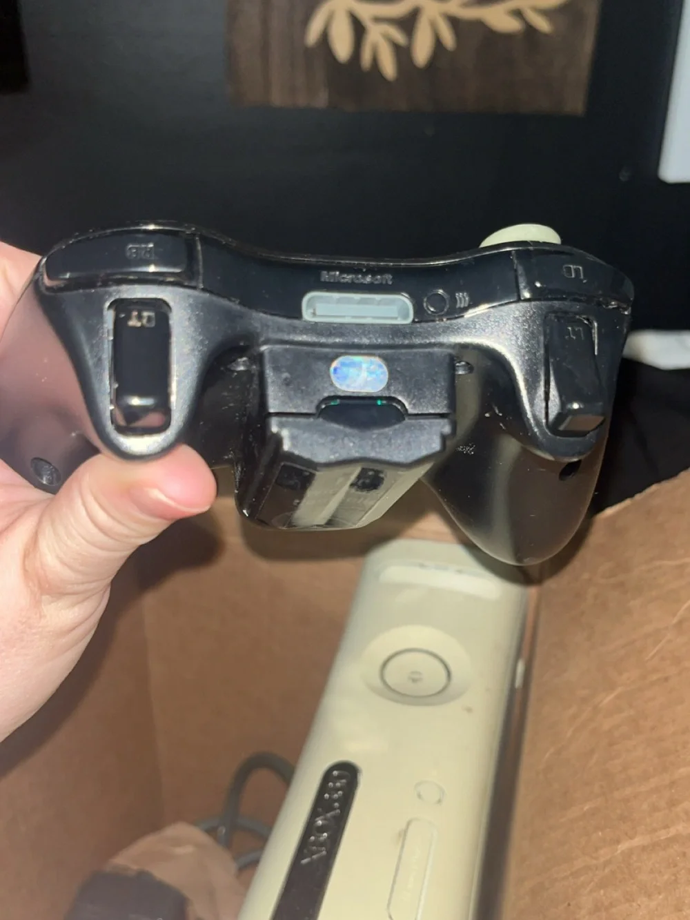 Black Xbox Controllers with Power Brick and Console